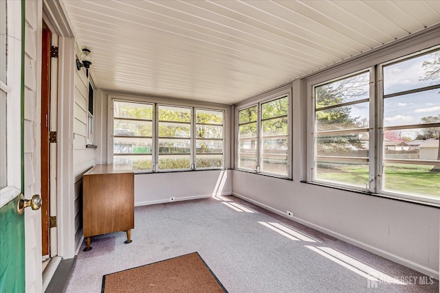 unfurnished sunroom featuring a healthy amount of sunlight