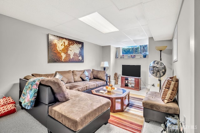 122 Salem Rd, North Brunswick, NJ 08902 - carpeted living room with a paneled ceiling