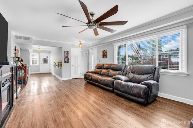 14 E Shirley Ave, Colonia, NJ 07067 - living room with a ceiling fan, crown molding, and light wood finished floors