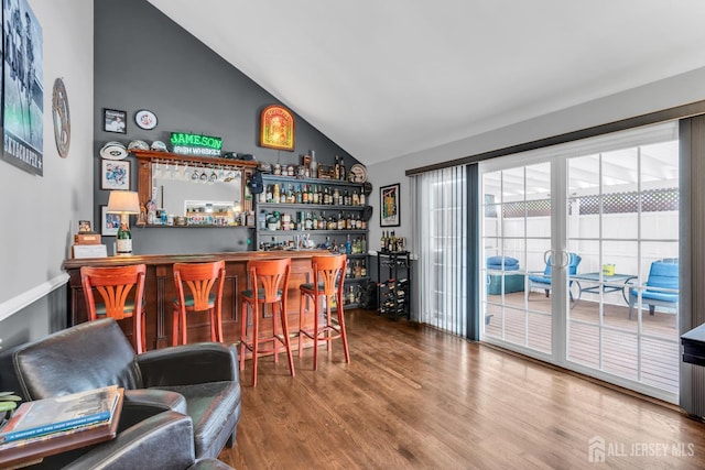 14 E Shirley Ave, Colonia, NJ 07067 - indoor dry bar featuring wood finished floors and high vaulted ceiling