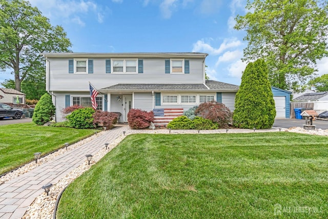 14 E Shirley Ave, Colonia, NJ 07067 - view of front facade with a front lawn and a garage