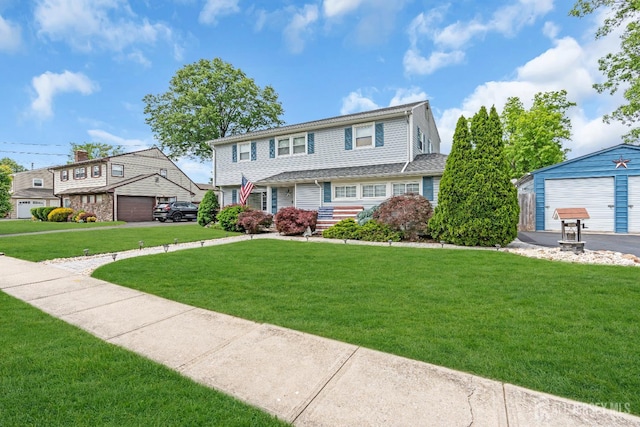 14 E Shirley Ave, Colonia, NJ 07067 - view of front of home featuring a front lawn and a detached garage