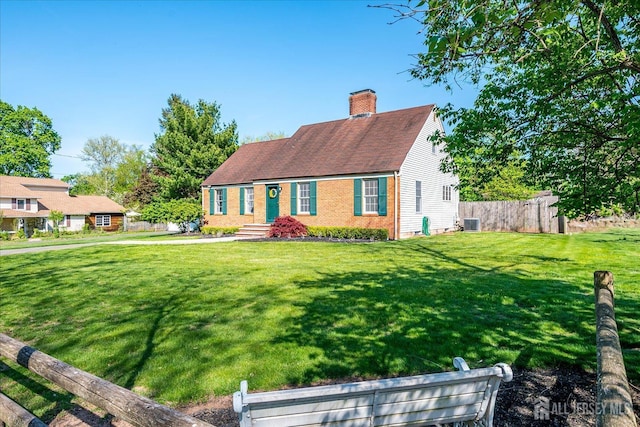 27 Vermont Ave, Franklin, NJ 08823 - new england style home featuring a chimney and brick siding