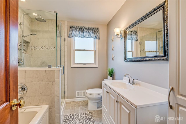 27 Vermont Ave, Franklin, NJ 08823 - full bathroom featuring a garden tub, a shower stall, vanity, and tile patterned floors