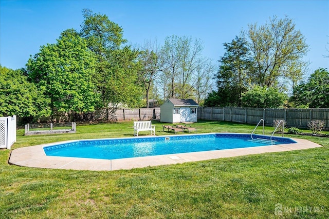 27 Vermont Ave, Franklin, NJ 08823 - view of swimming pool featuring a storage unit, a fenced backyard, and view of wooded area