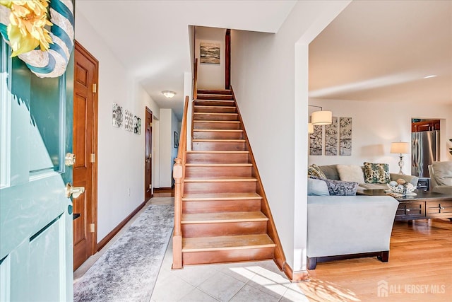 27 Vermont Ave, Franklin, NJ 08823 - stairs featuring baseboards and wood finished floors