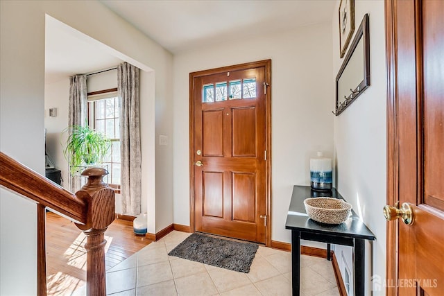 27 Vermont Ave, Franklin, NJ 08823 - foyer with light tile patterned floors and baseboards