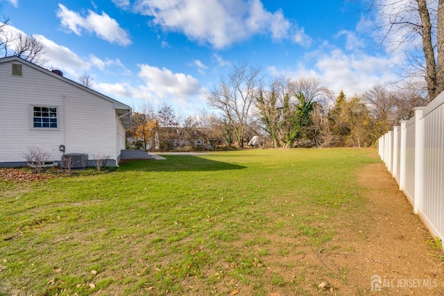 view of yard featuring central AC unit