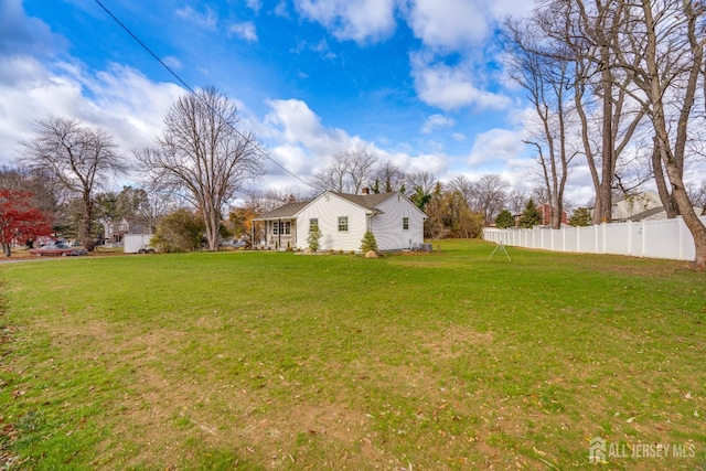 view of yard featuring fence