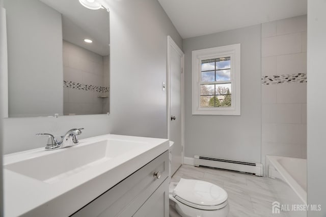 full bathroom featuring baseboard heating, vanity, a bathtub, marble finish floor, and toilet