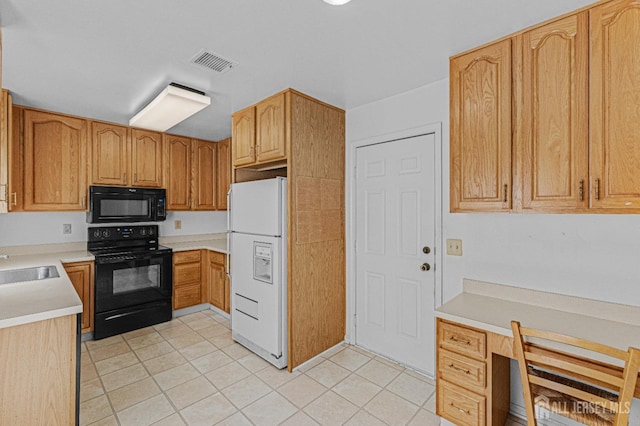714 Victoria Ct Unit B, Monroe, NJ 08831 - kitchen featuring black appliances, light countertops, light tile patterned floors, a sink, and a desk