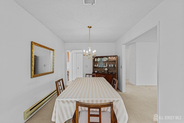 714 Victoria Ct Unit B, Monroe, NJ 08831 - dining room with a baseboard heating unit, light colored carpet, a chandelier, and a textured ceiling