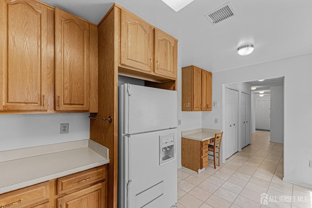 714 Victoria Ct Unit B, Monroe, NJ 08831 - kitchen with white refrigerator with ice dispenser, light tile patterned floors, and light countertops