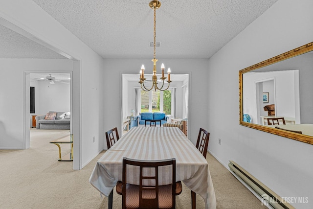 714 Victoria Ct Unit B, Monroe, NJ 08831 - dining space with a baseboard heating unit, a textured ceiling, carpet, and a chandelier