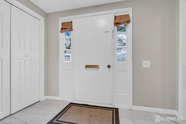 foyer entrance with plenty of natural light