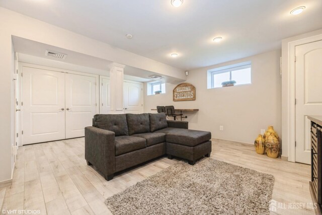 35 Winthrop Dr, Manalapan, NJ 07726 - living area featuring light wood-style flooring
