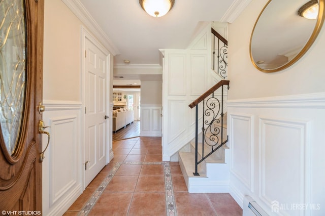 35 Winthrop Dr, Manalapan, NJ 07726 - entrance foyer featuring a decorative wall, inlaid floor details, stairway, wainscoting, and ornamental molding