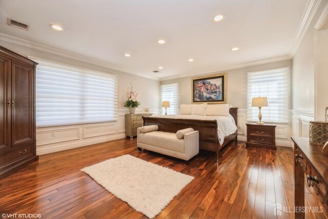 35 Winthrop Dr, Manalapan, NJ 07726 - bedroom featuring a decorative wall, dark wood-style flooring, a wainscoted wall, and ornamental molding