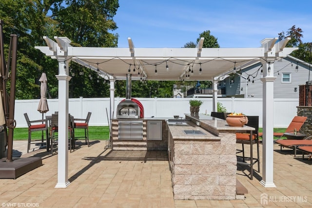 35 Winthrop Dr, Manalapan, NJ 07726 - fenced backyard with area for grilling and a patio area