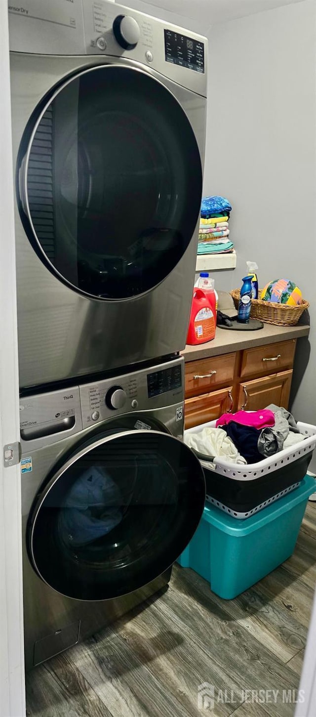 1485 Earie Way, Lacey, NJ 08731 - washroom with stacked washer / dryer and wood finished floors
