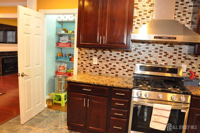 195-195 Wachung Ter, Scotch Plains, NJ 07076 - kitchen with wall chimney exhaust hood, stainless steel range with gas stovetop, tasteful backsplash, and light stone counters