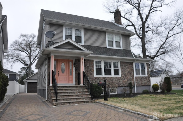 195-195 Wachung Ter, Scotch Plains, NJ 07076 - dutch colonial featuring stone siding, a chimney, a detached garage, roof with shingles, and entry steps
