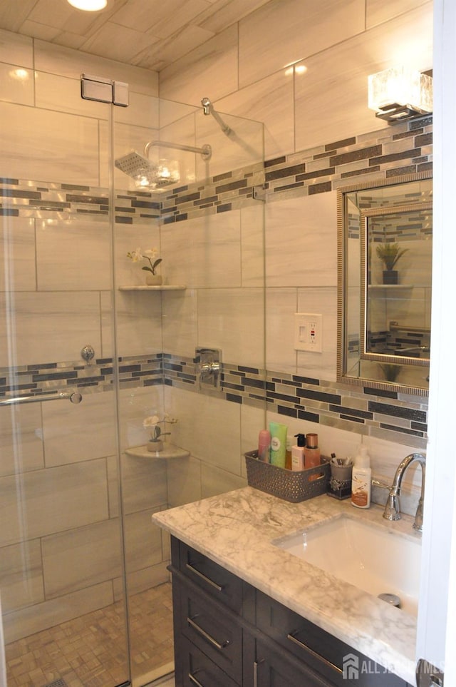 195-195 Wachung Ter, Scotch Plains, NJ 07076 - bathroom with a stall shower, vanity, and backsplash