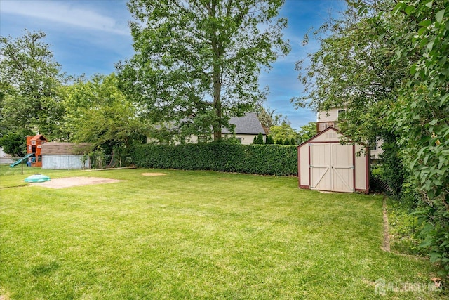 202 Garden Dr, South Plainfield, NJ 07080 - view of yard featuring a playground