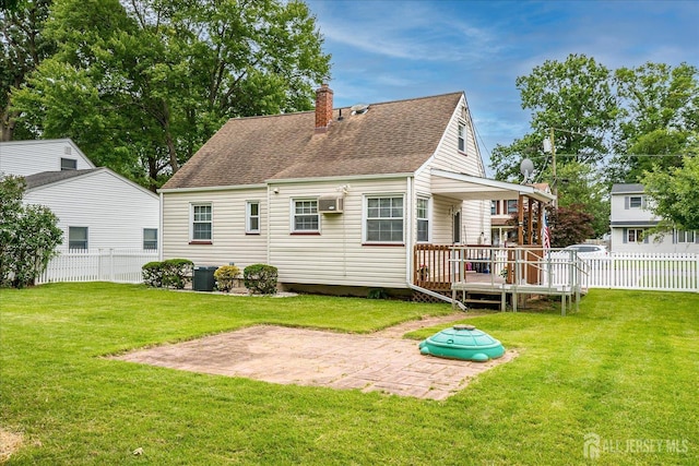 202 Garden Dr, South Plainfield, NJ 07080 - rear view of house with a patio, a chimney, a wooden deck, and a shingled roof
