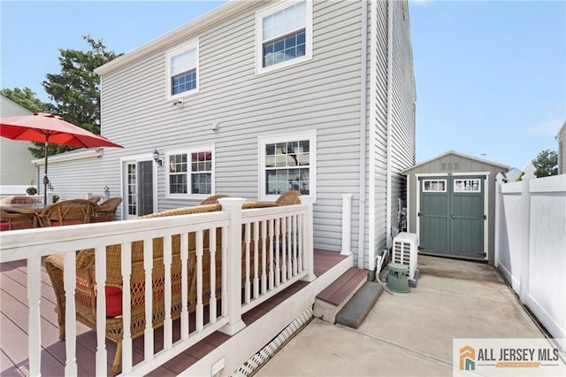 49 Lavender Dr, Edison, NJ 08820 - rear view of house with a storage shed and a deck