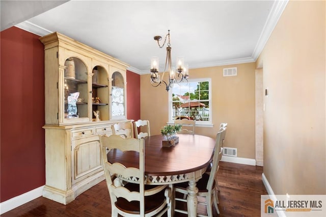 49 Lavender Dr, Edison, NJ 08820 - dining space with a chandelier, dark wood-type flooring, and crown molding