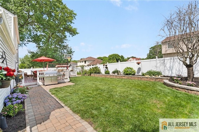 49 Lavender Dr, Edison, NJ 08820 - fenced backyard featuring a wooden deck and outdoor dining area