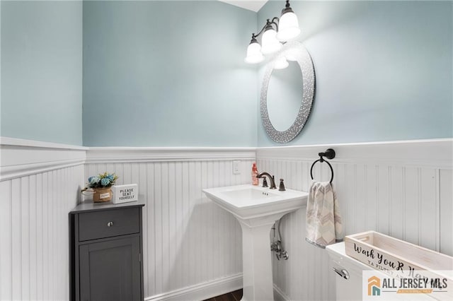 49 Lavender Dr, Edison, NJ 08820 - half bathroom with a wainscoted wall and a sink