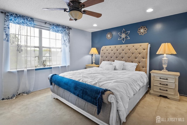 74 Kingfisher Ct, Marlboro, NJ 07746 - carpeted bedroom with a textured ceiling, recessed lighting, and ceiling fan
