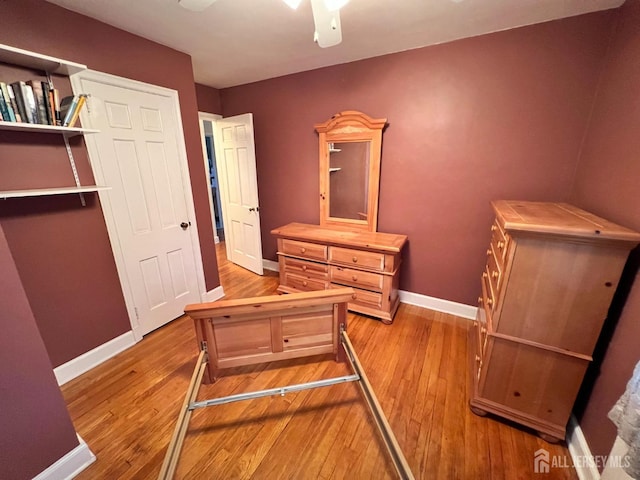 bedroom with ceiling fan and light wood-type flooring