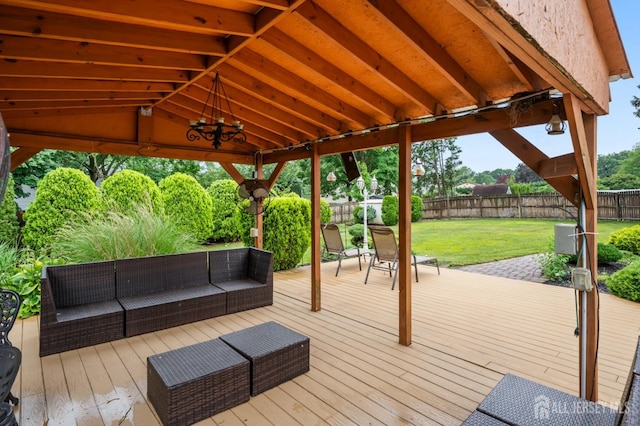 16 London Dr, East Brunswick, NJ 08816 - wooden deck with outdoor lounge area and a fenced backyard