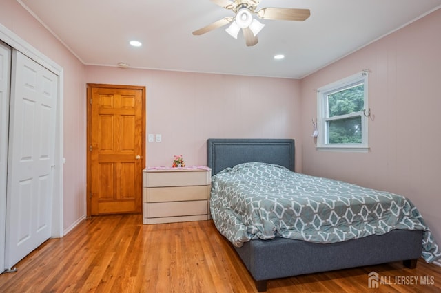 16 London Dr, East Brunswick, NJ 08816 - bedroom featuring wood finished floors, crown molding, a ceiling fan, a closet, and recessed lighting