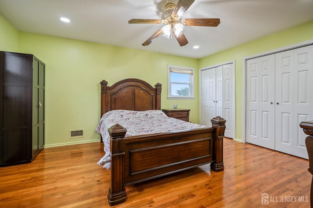 16 London Dr, East Brunswick, NJ 08816 - bedroom with two closets, recessed lighting, light wood finished floors, and ceiling fan