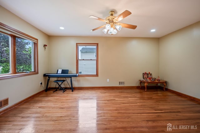 16 London Dr, East Brunswick, NJ 08816 - unfurnished room featuring wood finished floors, recessed lighting, a ceiling fan, and a desk