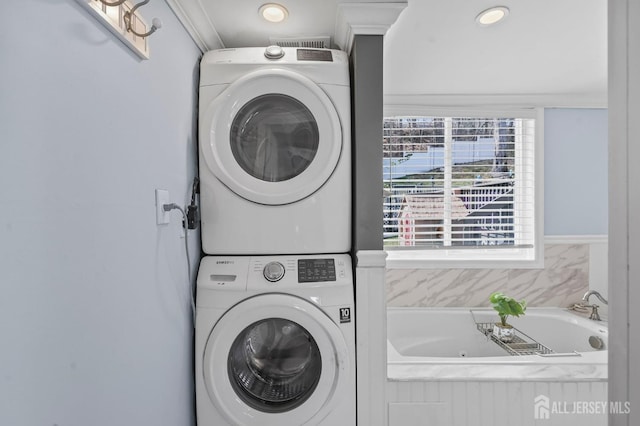 26 Venus Rd, Old Bridge, NJ 08879 - washroom with stacked washer and clothes dryer and ornamental molding