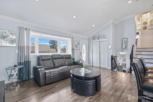 26 Venus Rd, Old Bridge, NJ 08879 - living area with wood finished floors, high vaulted ceiling, ornamental molding, recessed lighting, and baseboards