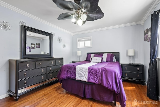 26 Venus Rd, Old Bridge, NJ 08879 - bedroom featuring crown molding, wood finished floors, and a ceiling fan