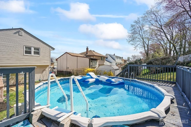 26 Venus Rd, Old Bridge, NJ 08879 - view of pool with a fenced backyard, a residential view, and a deck