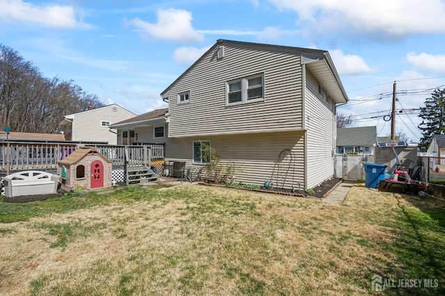 26 Venus Rd, Old Bridge, NJ 08879 - rear view of house with a wooden deck