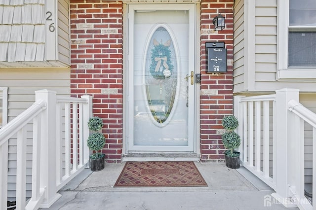 26 Venus Rd, Old Bridge, NJ 08879 - doorway to property featuring brick siding