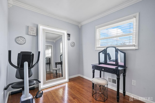 26 Venus Rd, Old Bridge, NJ 08879 - exercise room with ornamental molding, plenty of natural light, wood finished floors, and baseboards