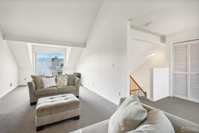 living room with carpet flooring, lofted ceiling, and baseboards
