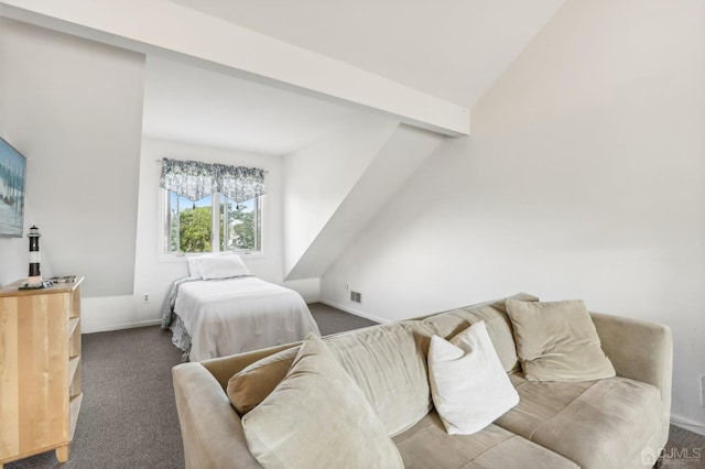 carpeted bedroom with baseboards and vaulted ceiling