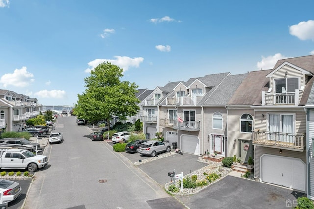 view of asphalt street with a residential view
