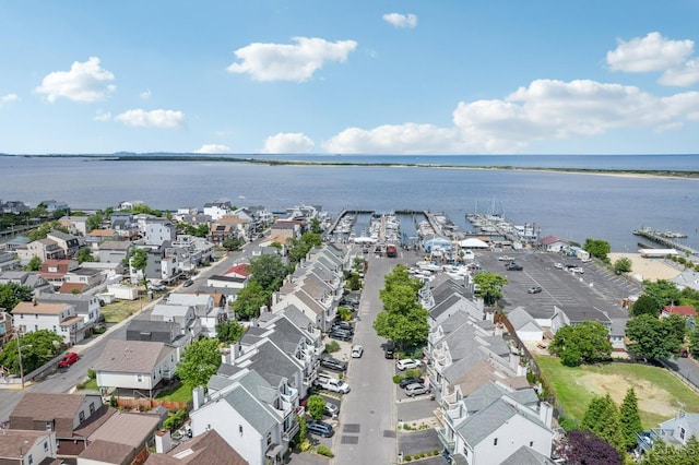 aerial view of residential area with a nearby body of water